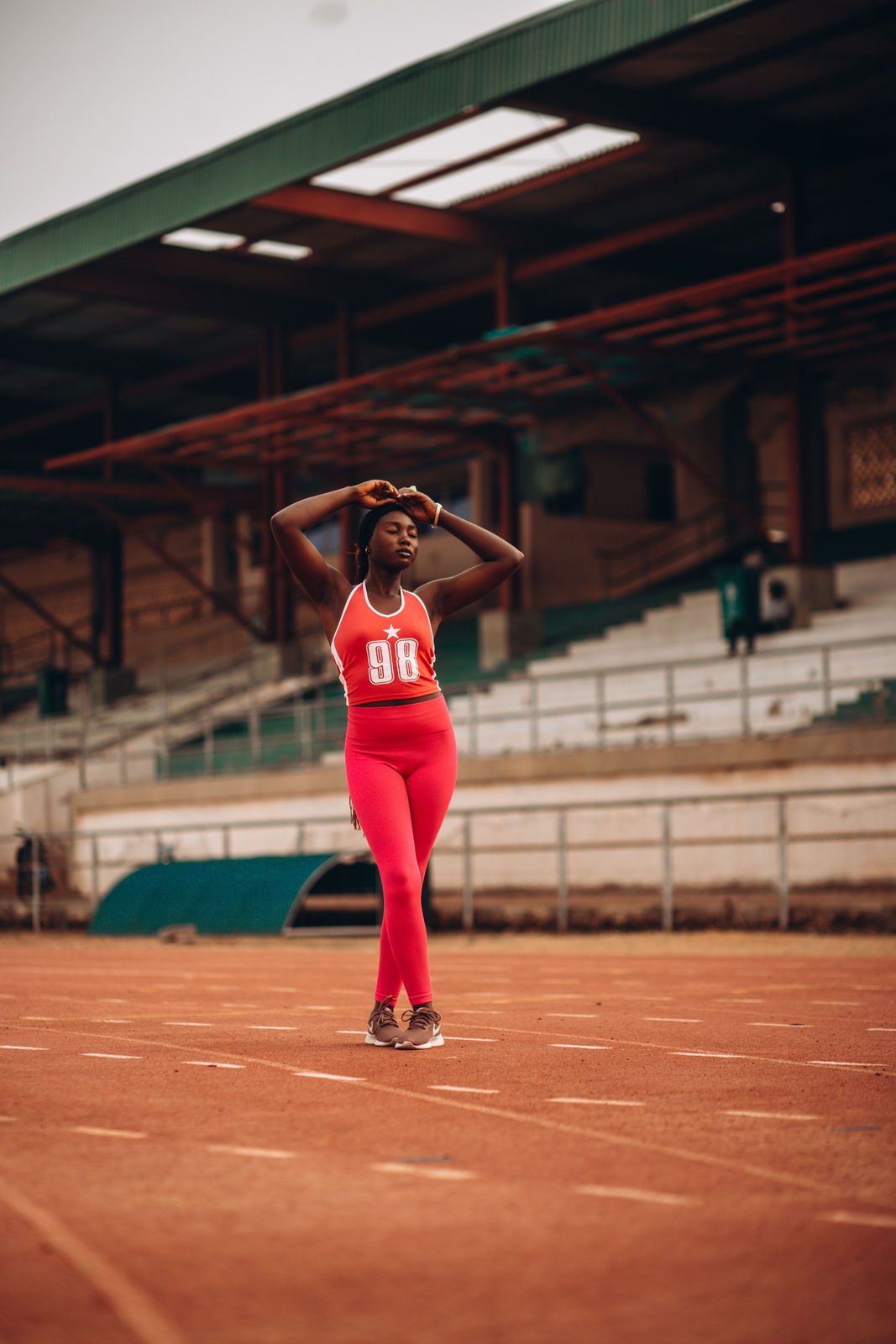 Athlete standing on an outdoor running track