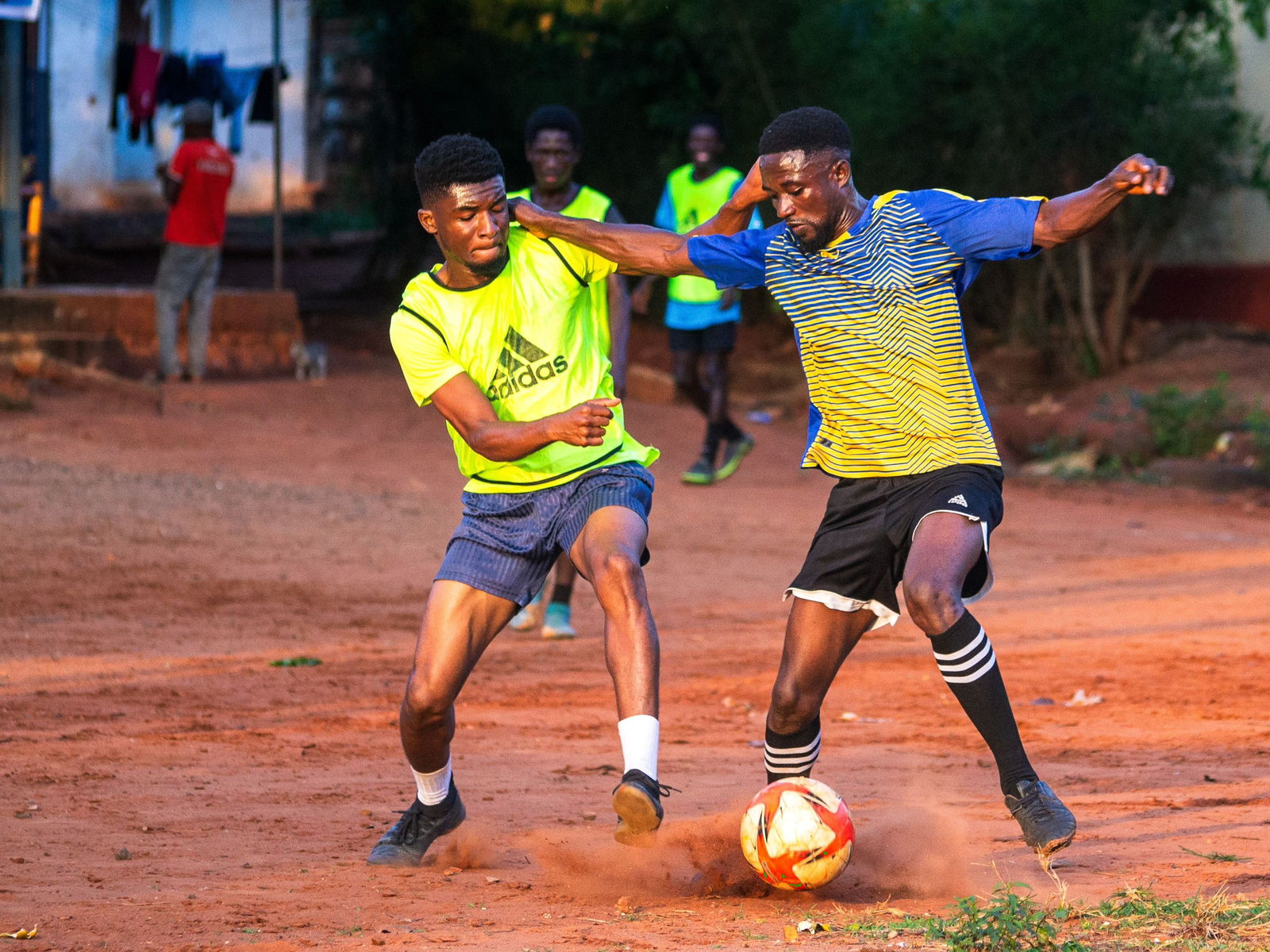 Football players competing on an outdoor field